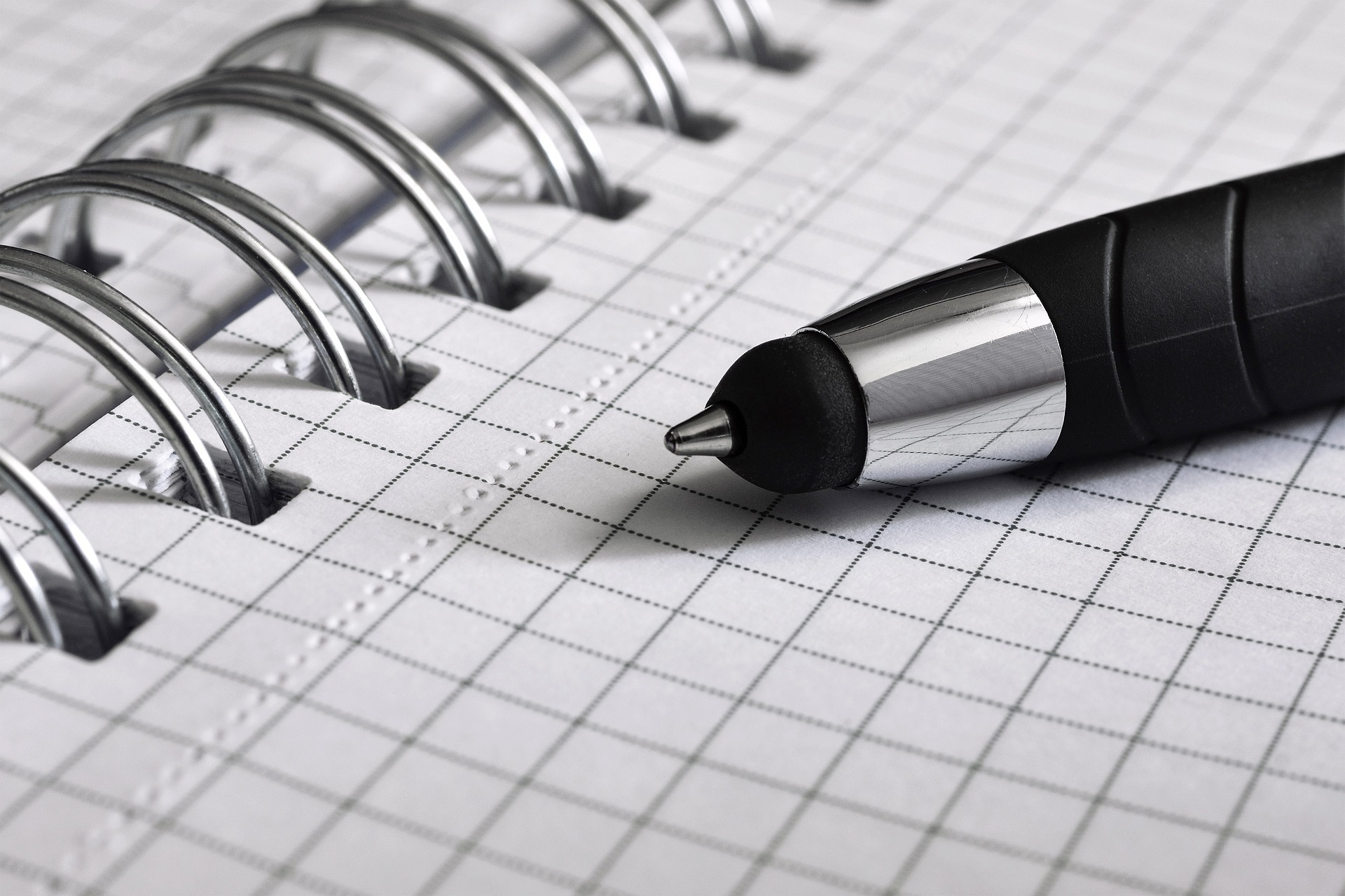 Pen Over Book Image